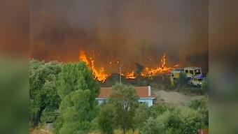Over 1,000 firefighters, planes, helicopters battle wildfires in Portugal’s Castelo Branco region; one civilian seriously injured