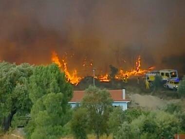 Over 1,000 firefighters, planes, helicopters battle wildfires in Portugal’s Castelo Branco region; one civilian seriously injured