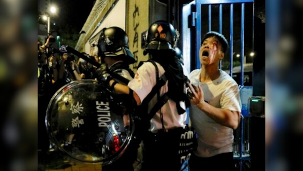 Hong Kong protests: Six hurt by fireworks amid clashes with police over arrest of 44 people on riot charges