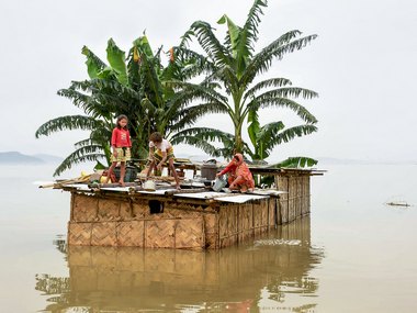 Floods claim 15 lives in Assam as 30 of state's 33 districts badly affected; Sarbananda Sonowal briefs Narendra Modi on situation Floods claim 15 lives in Assam as 30 of state's 33 districts badly affected; Sarbananda Sonowal briefs Narendra Modi on situation