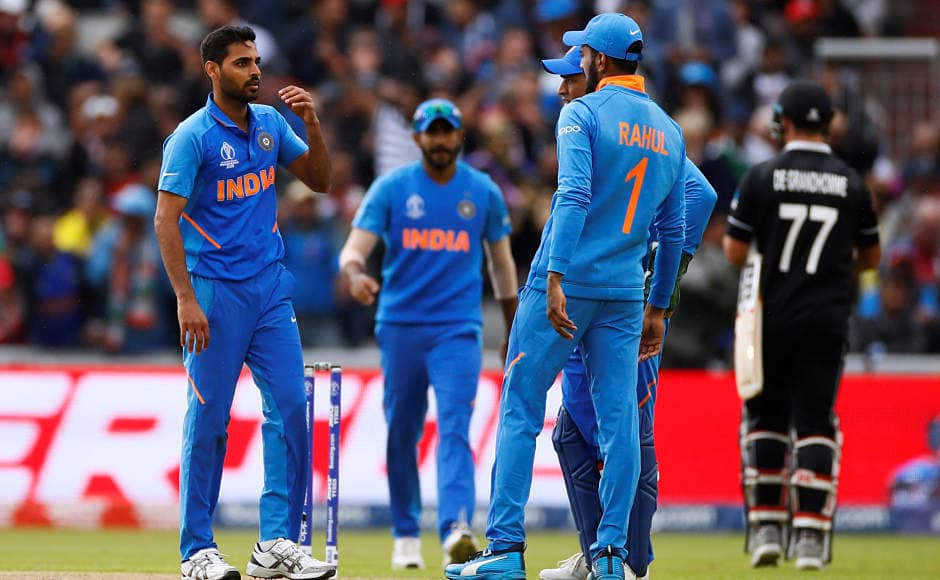Bhuvneshwar Kumar celebrates after dismissing Colin de Grandhomme for 16 runs. Bhuvneshwar finished with figures of 3/43. Reuters