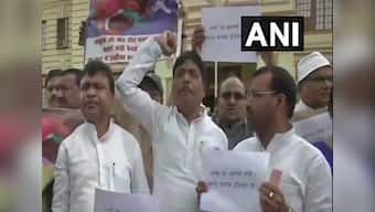 RJD MLAs raise slogans against Bihar health minister, protest against growing encephalitis deaths in state