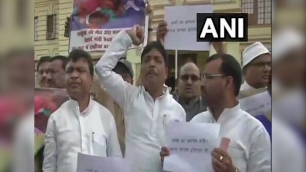 RJD MLAs raise slogans against Bihar health minister, protest against growing encephalitis deaths in state