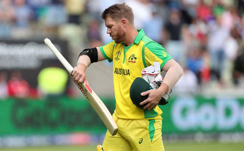 Australia opener David Warner walks back after being dismissed for just nine runs. Chris Woakes drew first blood to dismiss the former vice-captain in the third over. AP