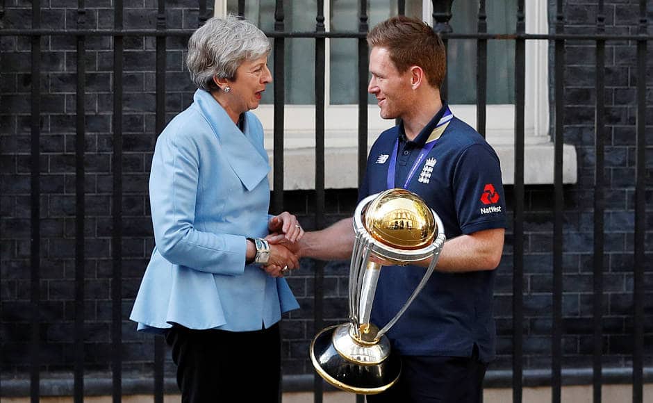 England skipper Eoin Morgan shakes hands with Theresa May. Reuters