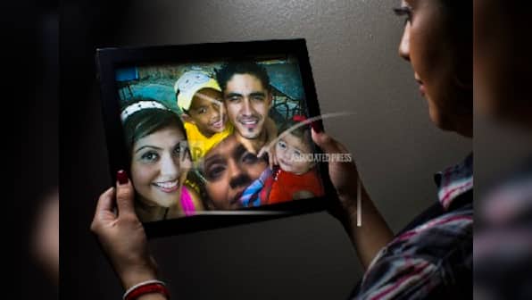 American, 33, who was deported to El Salvador two years ago returns home; ‘We’re whole again, we’re a family’, says his wife