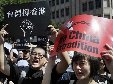 China hints at deployment of military in Hong Kong to quell anti-extradition protests that have raged for past 2 months China hints at deployment of military in Hong Kong to quell anti-extradition protests that have raged for past 2 months
