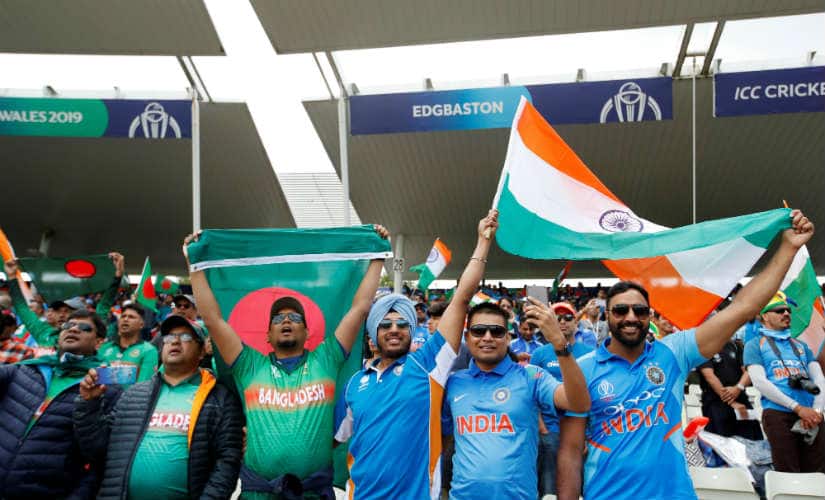 India and Bangladesh fans cheer at Edgbaston. Reuters