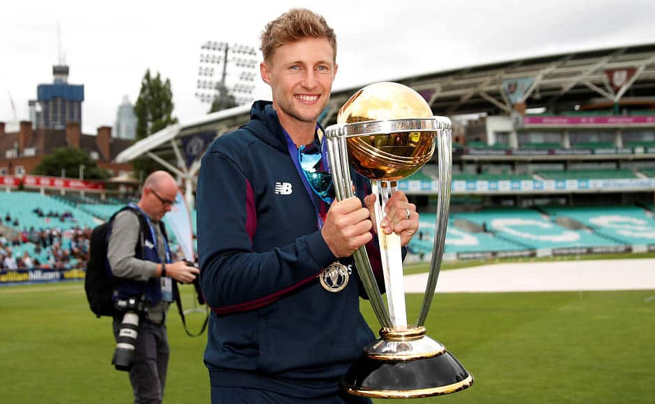 England’s Joe Root poses for a picture with the World Cup trophy. Reuters 