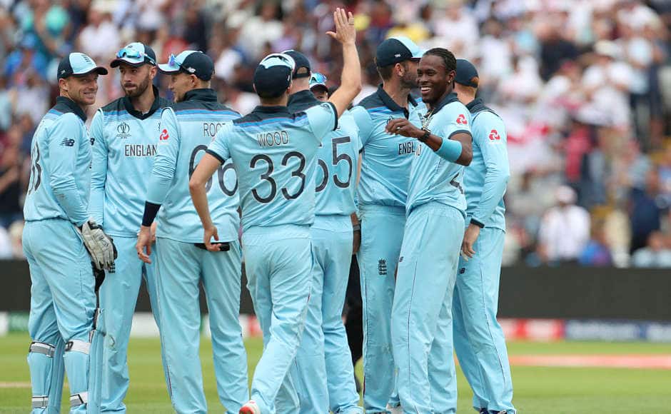 Jofra Archer and his England teammates are all smiles following the dismissal of Glenn Maxwell. AP