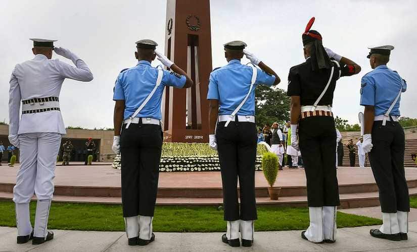 Tri-services personnel pay homage at National War Memorial on the occasion of Kargil Diwas on 26 July. PTI