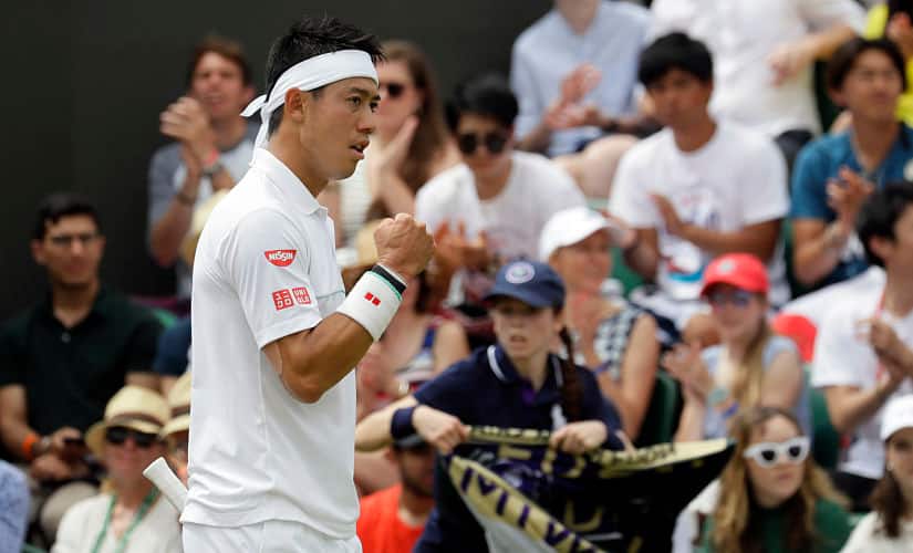Japan’s Kei Nishikori reacts after winning a point against United States’ Steve Johnson in a Men’s singles match during day six of the Wimbledon Tennis Championships in London, Saturday, July 6, 2019. (AP Photo/Kirsty Wigglesworth)