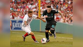 Premier League: Alejandro Pozo's last-minute strike guides 10-man Sevilla to a 2-1 win over Liverpool in pre-season friendly