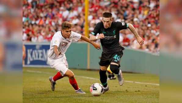 Premier League: Alejandro Pozo's last-minute strike guides 10-man Sevilla to a 2-1 win over Liverpool in pre-season friendly
