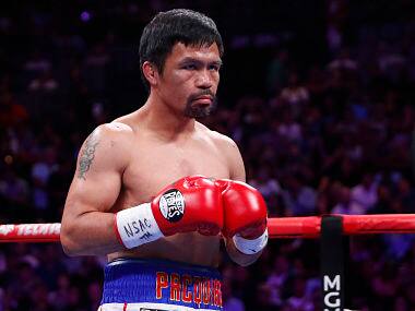 Manny Pacquiao's trainer Freddie Roach mulls on Filipino boxer's retirement, admits rematch against Floyd Mayweather unlikely