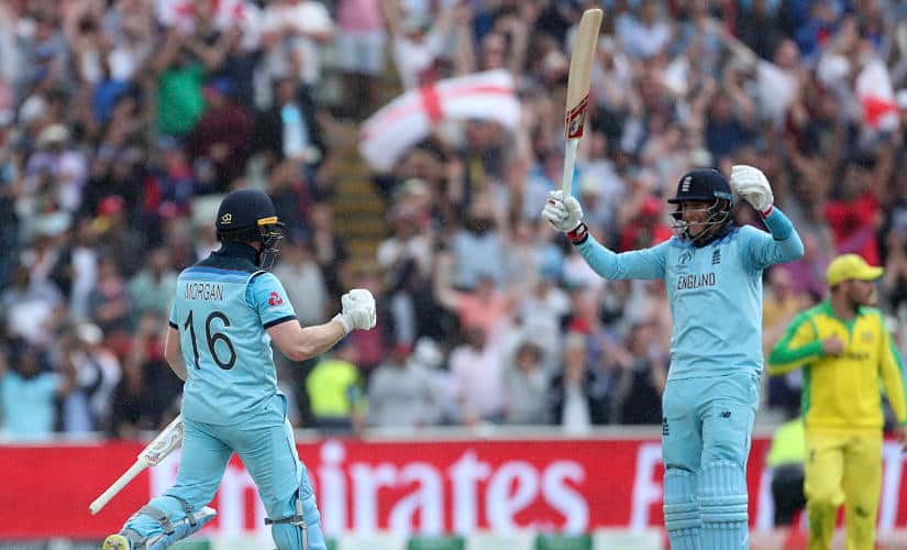 England’s captain Eoin Morgan, left, and Joe Root celebrate their win over Australia in the Cricket World Cup semi-final match at Edgbaston in Birmingham, England, Thursday, July 11, 2019. (AP Photo/Aijaz Rahi)