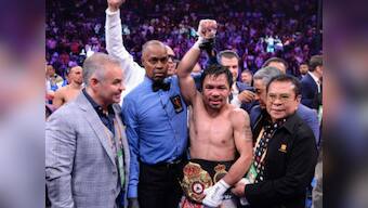 Manny Pacquiao beats Keith Thurman by split decision to become oldest welterweight champion in boxing history