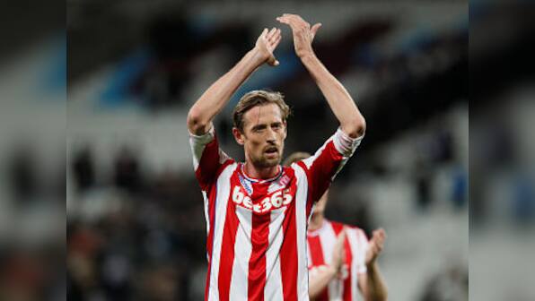 Former England, Stoke City striker Peter Crouch announces retirement from football at the age of 38