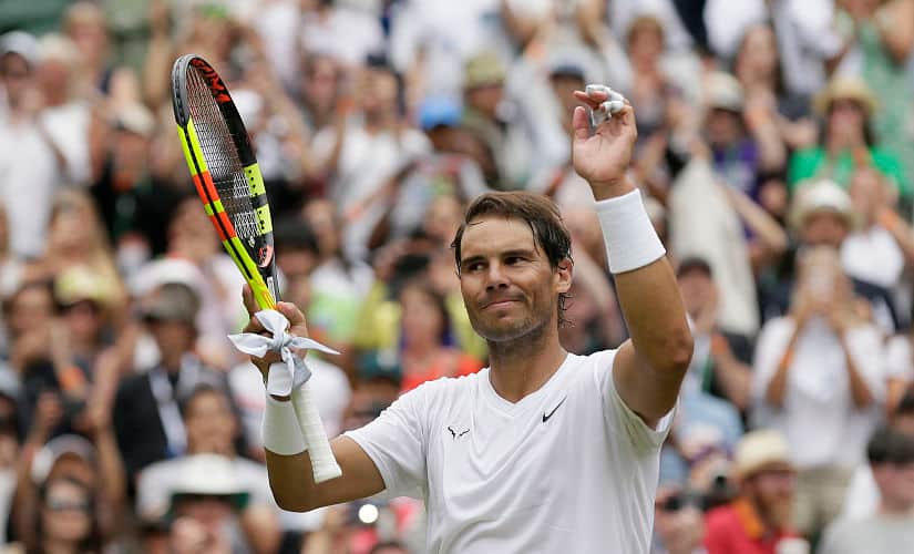 Spain’s Rafael Nadal reacts after beating Jo-Wilfried Tsonga of France in a Men’s singles match during day six of the Wimbledon Tennis Championships in London, Saturday, July 6, 2019. (AP Photo/Tim Ireland)