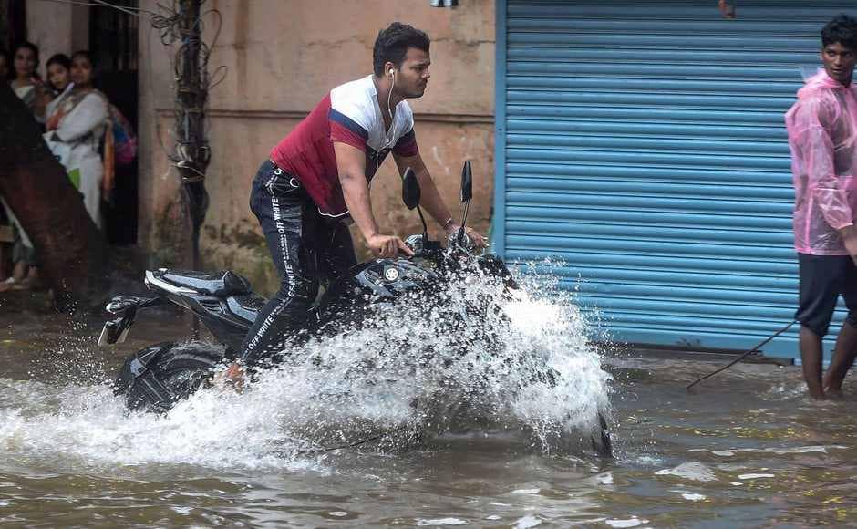 The heavy cloud formation was bringing more rains to the city, the IMD official said. A viral video showed a gaping manhole in Chembur swallowing a bike. PTI swallowing a bike. PTI The heavy cloud formation was bringing more rains to the city, the IMD official said. A viral video showed a gaping manhole in Chembur swallowing a bike. PTI swallowing a bike. PTI