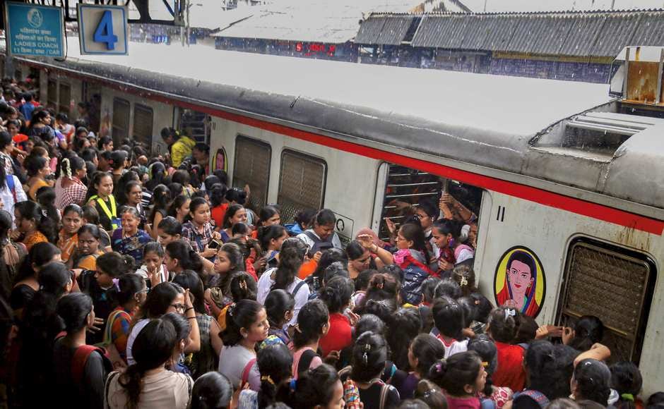 Several local trains on the Central and Western lines were also cancelled due to flooding on the tracks, railway officials said. Passengers at Thane railway station after heavy monsoon rains hit the local train services,. PTI Several local trains on the Central and Western lines were also cancelled due to flooding on the tracks, railway officials said. Passengers at Thane railway station after heavy monsoon rains hit the local train services,. PTI