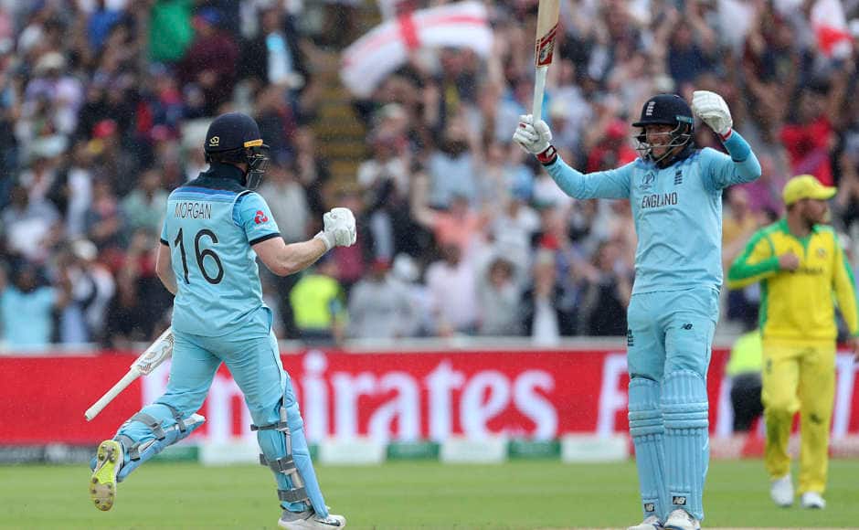 England captain Eoin Morgan and Joe Root celebrate the team’s eight-wicket win over the defending champions Australia. The hosts have made it to the tournamet’s final for the first time since 1992. AP
