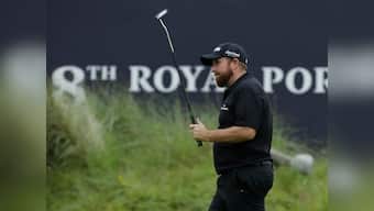 The Open 2019: Shane Lowry, JB Holmes share lead as Tiger Woods and pre-tournament favourite Rory McIlroy miss cut