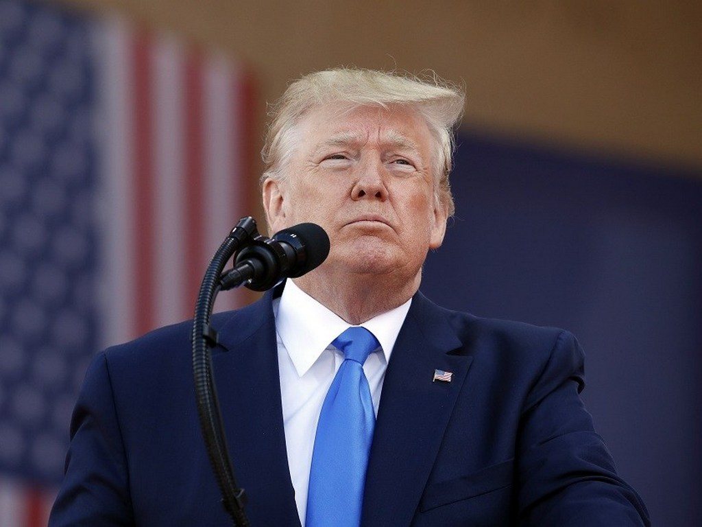 President Donald Trump speaks during a ceremony to commemorate the 75th anniversary of D-Day at The Normandy American Cemetery, Thursday, June 6, 2019, in Colleville-sur-Mer, Normandy, France. (AP Photo/Alex Brandon)