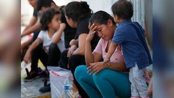 Confusion, fear reigns over asylum-seekers at US-Mexico border after new immigration policy comes into force