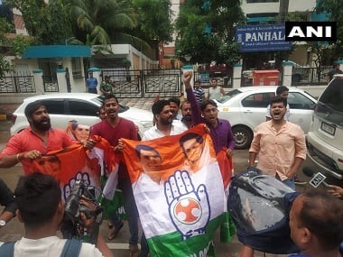Congress workers protesting outside Mumbai's Sofitel hotel. ANI