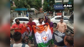 Security increased outside Mumbai hotel where ten disgruntled Karnataka MLAs are lodged after Congress workers protest