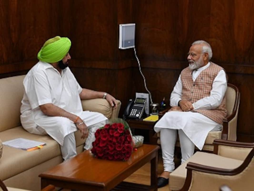 Captain Amarinder Singh calls on Narendra Modi in first 'courtesy meeting' since Lok Sabha election results-Politics News , Firstpost