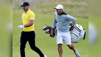 British Open: World No 1 Brooks Koepka benefitting from caddie's local knowledge, not passing tips to Tiger Woods