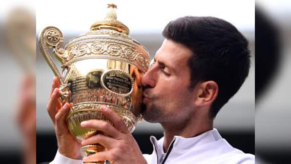 Wimbledon 2019: Novak Djokovic holds nerve in knife-edge encounter to beat Roger Federer and clinch fifth title