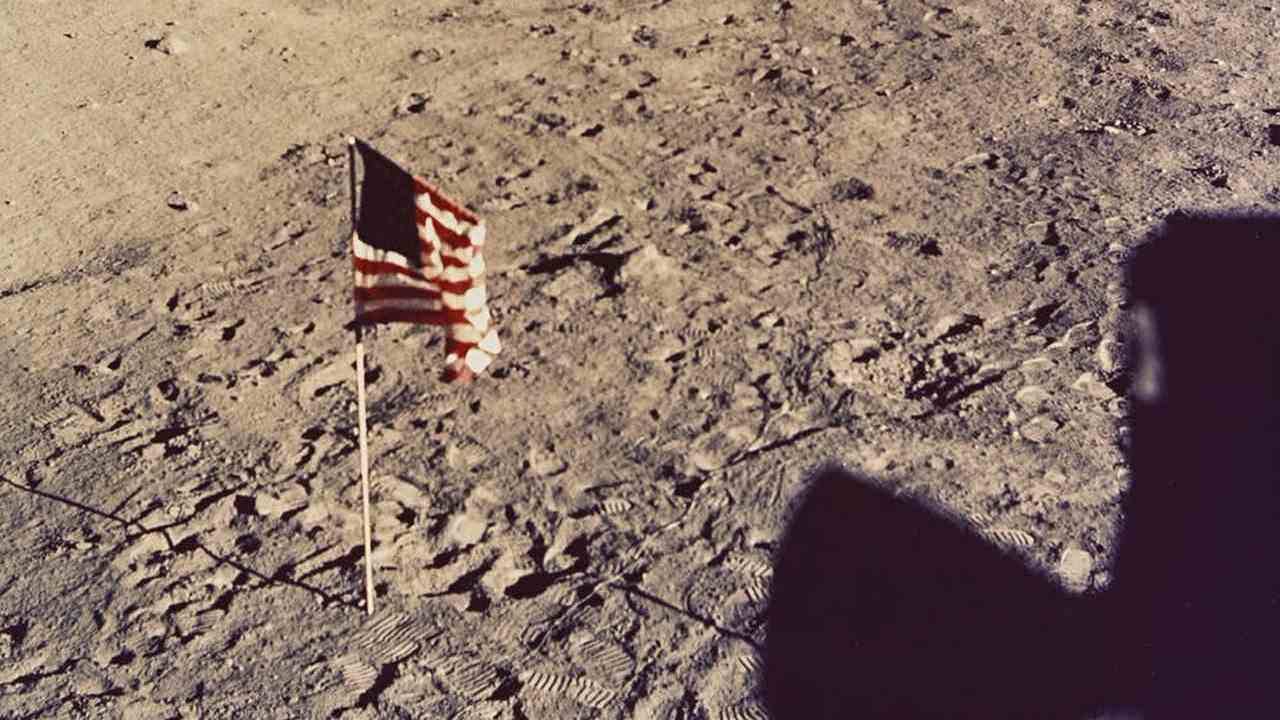 NASA Washington DC, United States flag on moon surface with lunar surface television camera in background 1969, type C photograph. National Gallery of Victoria, Melbourne. Purchased 1980