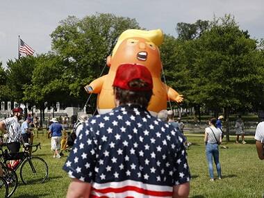 Protesters demonstrated against Donald Trump by inflating a diaper-clad balloon of him. AP