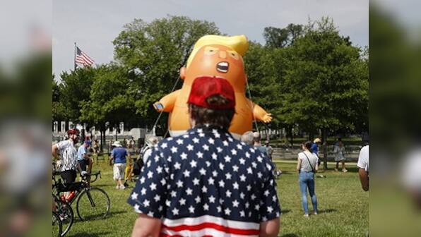 Donald Trump urges Americans to ‘stay true to the cause' in 4 July speech; protesters accuse US president of co-opting occasion