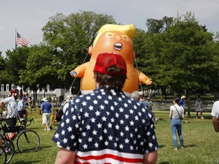 Donald Trump urges Americans to ‘stay true to the cause' in 4 July speech; protesters accuse US president of co-opting occasion