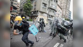 Hong Kong protests: Police use tear gas, batons to disperse protesters in Yuen Long area as face-off escalates