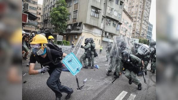 Hong Kong protests: Police use tear gas, batons to disperse protesters in Yuen Long area as face-off escalates