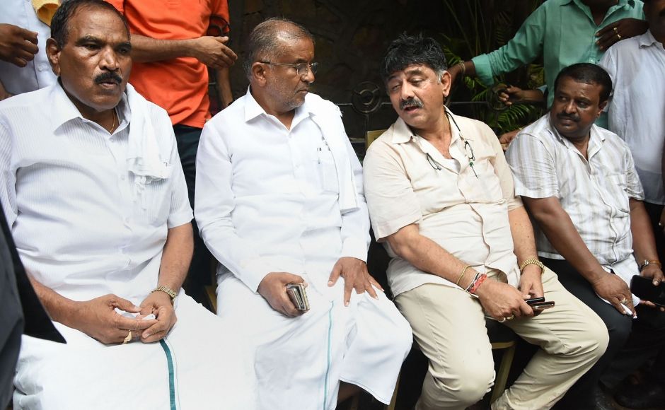 There was high drama on a rainy day on the streets of Mumbai when state Irrigation Minister and Congress' chief troubleshooter DK Shivakumar sought to enter a hotel where the dissident MLAs were lodged. He wanted to meet them to persuade them to come back to the ruling fold. PTI There was high drama on a rainy day on the streets of Mumbai when state Irrigation Minister and Congress' chief troubleshooter DK Shivakumar sought to enter a hotel where the dissident MLAs were lodged. He wanted to meet them to persuade them to come back to the ruling fold. PTI