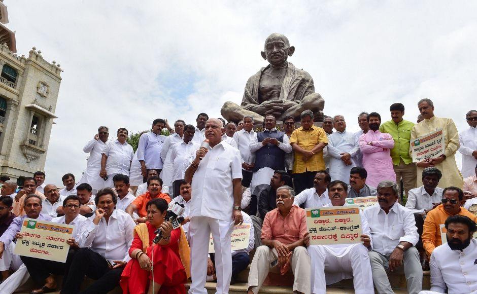 The BJP in Karnataka staged a 'dharna' at the Vidhana Soudha, demanding the resignation of Chief Minister HD Kumaraswamy. Later, state BJP chief BS Yeddyurappa also led BJP delegations to meet the governor and Speaker, demanding the dismissal of the coalition government. PTI The BJP in Karnataka staged a 'dharna' at the Vidhana Soudha, demanding the resignation of Chief Minister HD Kumaraswamy. Later, state BJP chief BS Yeddyurappa also led BJP delegations to meet the governor and Speaker, demanding the dismissal of the coalition government. PTI