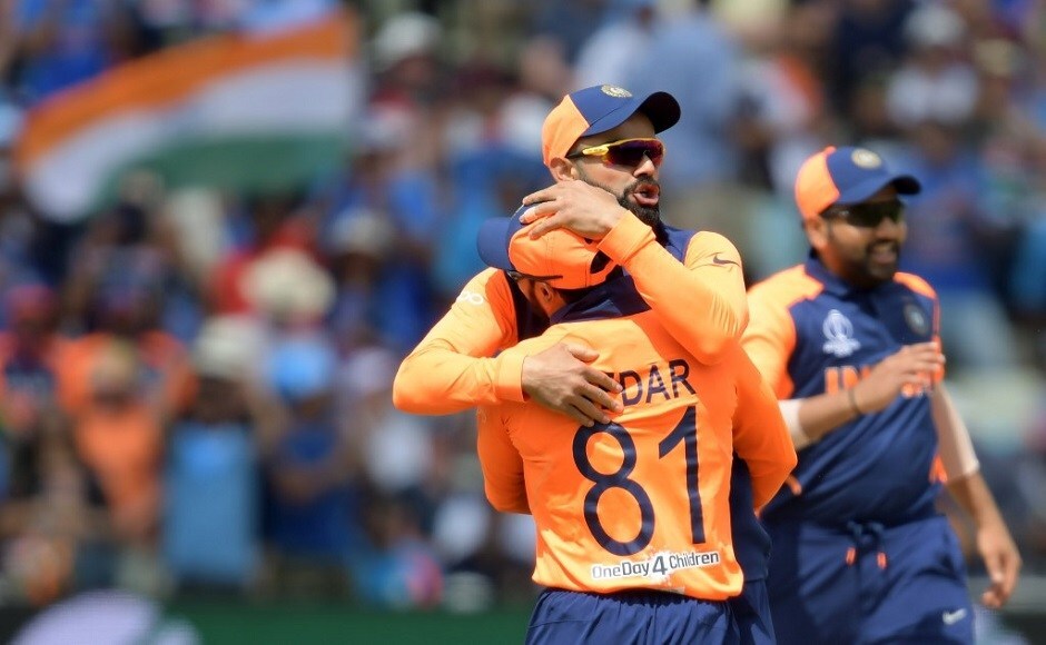 Virat Kohli celebrates with Kedar Jadhav after the wicket of England captain Eoin Morgan. AFP Virat Kohli celebrates with Kedar Jadhav after the wicket of England captain Eoin Morgan. AFP
