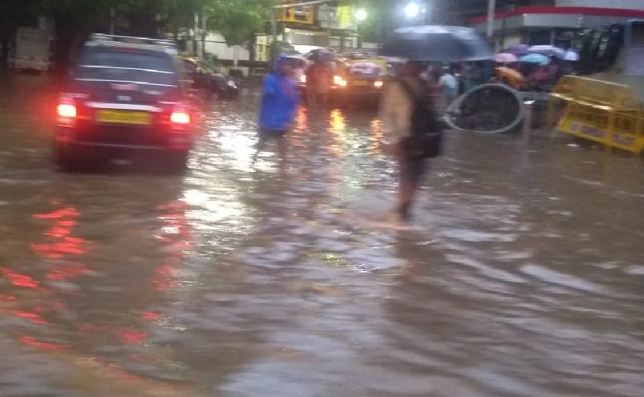 Commuters in Parel could be seen wading through water. Photo procured by Sulekha Nair, Firstpost. Commuters in Parel could be seen wading through water. Photo procured by Sulekha Nair, Firstpost.