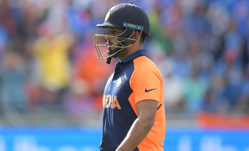 India’s Rishabh Pant walks back to the pavilion after his dismissal during the 2019 Cricket World Cup group stage match between England and India at Edgbaston in Birmingham, central England, on June 30, 2019. (Photo by Dibyangshu Sarkar / AFP) / RESTRICTED TO EDITORIAL USE