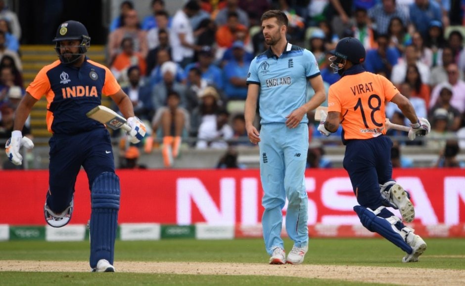 Rohit Sharma and Virat Kohli ran India close before the middle order's woes surfaced yet again. AFP Rohit Sharma and Virat Kohli ran India close before the middle order's woes surfaced yet again. AFP