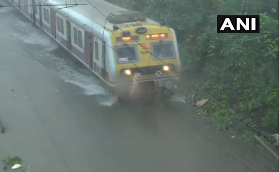 The railway tracks between Sion and Matunga stations were submerged. Twitter @ANI The railway tracks between Sion and Matunga stations were submerged. Twitter @ANI