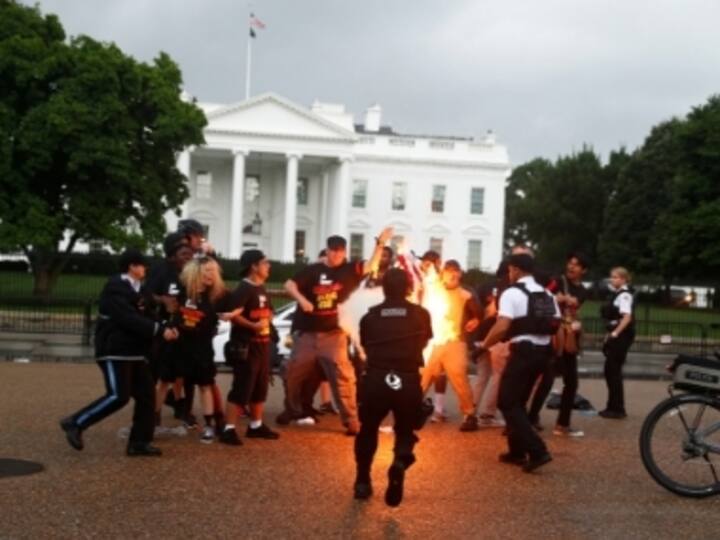 Clashes erupt outside White House after protesters torch US flag on American Independence Day; two secret service agents injured