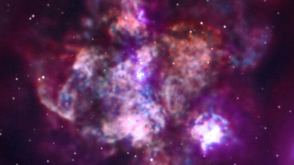 The 30 Doradus, nicknamed “Tarantula Nebula,” is one of the largest star-forming regions located close to the Milky Way. This image has data from 24 days of observation. Image credit: NASA/CXC