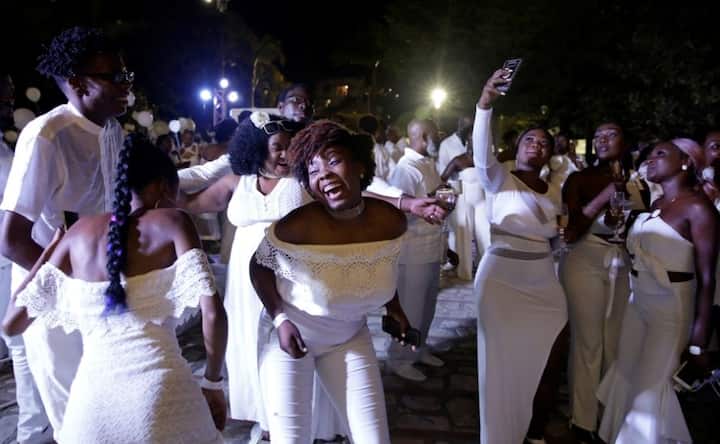 At Haiti's Diner en Blanc 2019 celebration, chic attendees, Jessie Woo performance are highlights At Haiti's Diner en Blanc 2019 celebration, chic attendees, Jessie Woo performance are highlights